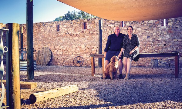 Alby and Leah Trotta, with Ernie, in the old stables at Flinders Gin, which will soon be a tasting room.