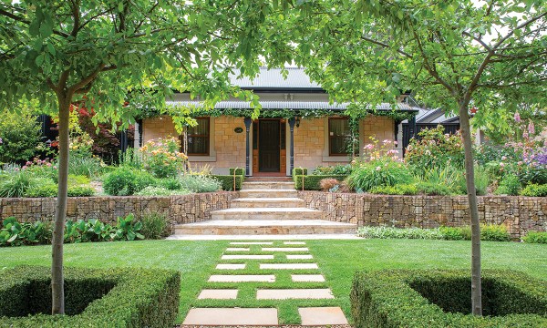 Gabion Basket Range stone walls flank the entry to Wellswood Cottage.