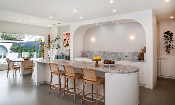 Sweeping curves feature in the kitchen by Wall Bros. Designer Kitchens.