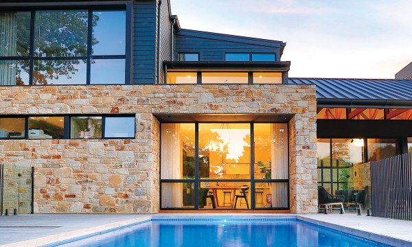  James and Andrea wanted to feel close to water, so they designed the pool to sit directly outside the dining space.