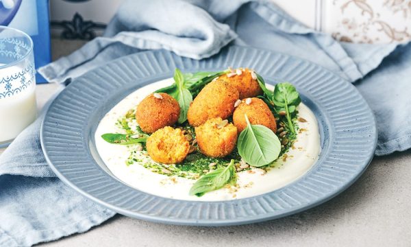 Thumbnail for Recipe: Pumpkin & quinoa fritters with tahini yoghurt & kale pesto