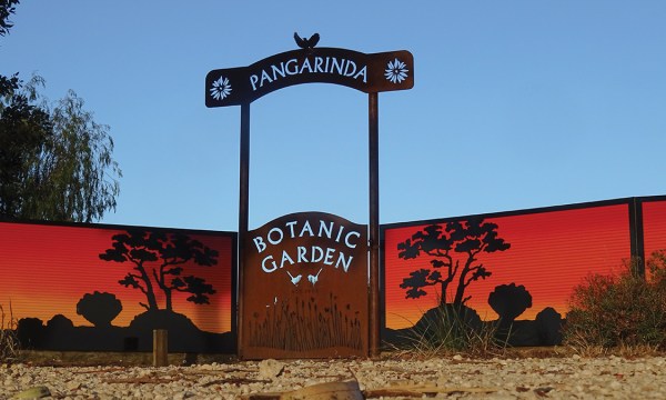 A stunning steel sign welcomes guests to the botanic garden.