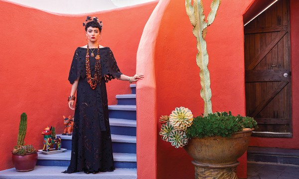 Botanic lace off-shoulder gown, $1699, from Carla Zampatti; Amber bangles, $22 each, from Bauhaus; 18ct yellow gold cuff bangle, $8500, 9ct yellow gold bracelet, $6100, 9ct yellow gold amber pendant, $3200, Amber bracelet, $800, Oval citrine ring, $1400, from James Thredgold Jeweller; Multi strand Baltic amber necklet, $4800, from Aurum Jewels; Liberte Bodhi gold hoop, $69.95, from Fashada; Black silk floral headpiece, $390, from Sylvy Earl.