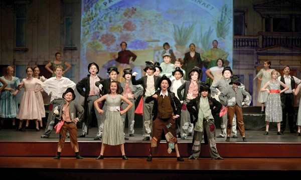 Adelaide Youth Theatre performers on stage.