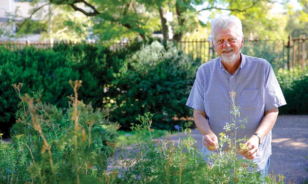 The Adelaide Botanic Garden’s John Sandham with Ruta graveolens or common rue