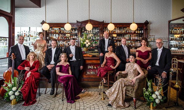 Some of the married couples at the Adelaide Symphony Orchestra are Chris and Sherri Handley, Alison Heike and Mark Gaydon, Emma Perkins and Cameron Waters, Martin Butler and Sherin Lim, Dave Khafagi and Janet Anderson, and Sarah and Ian Denbigh. (Photographed at Apoteca, Hindley Street; gowns by After Dark; flowers supplied by Interflora)