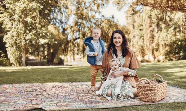 Emily wears The Basic dress, $109, Hooded jacket, $139, from Zara. Sam wears Chambray shirt, $27.95, Mustard skinny jean, $27.95, Blue puffer vest, $32.95, from Zara. Lucy wears Wilson + Frenchy knitted overall, $64.95, Toshi Marley organic booties, $24.95, Piper bug headband, $14.95, from The Infant Boutique.