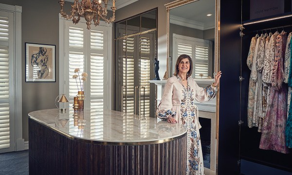 Mary’s wardrobe features an oval European oak island as a centrepiece, with clever storage.