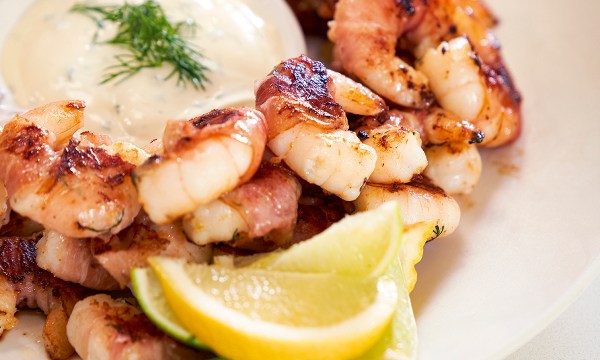 Thumbnail for Recipe: Pan-fried pancetta-wrapped prawns with lemon and dill aioli