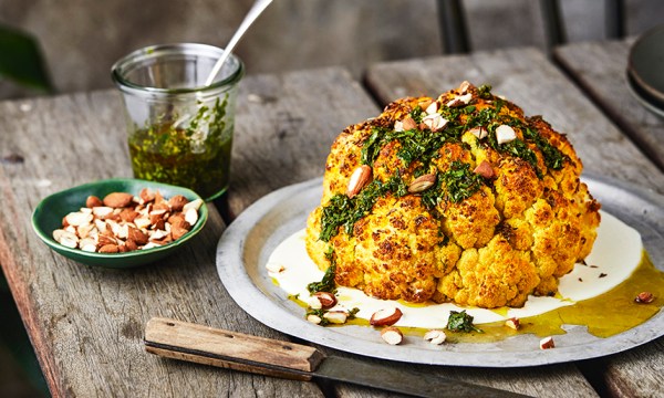 Thumbnail for Whole roasted cauliflower with tahini yoghurt, parsley sauce and roasted almonds