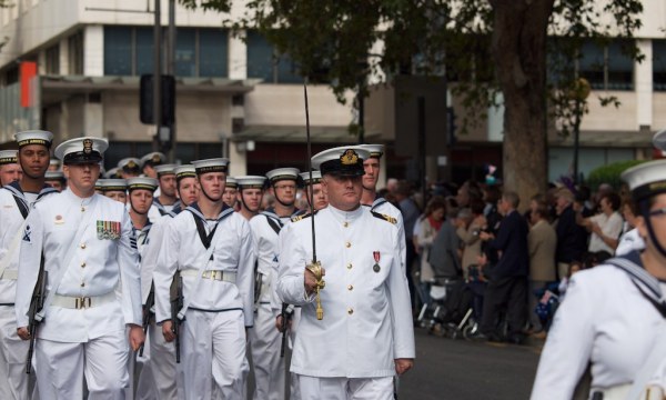 LCDR Alex Ward RANR leads the combined, NHQ-SA, JEWOSU and HMAS ARUNTA Guard through the centre of Adelaide for ANZAC Day 2010.